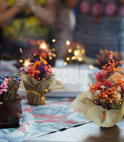 Small colorful flower arrangements on a table