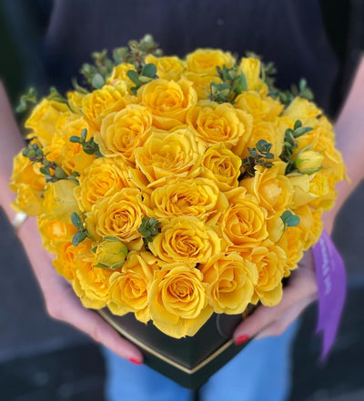 Heart-shaped yellow rose arrangement
