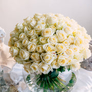 White Roses in a glass vase